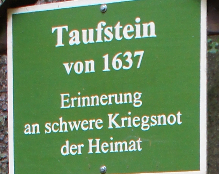 Tafel am Taufstein